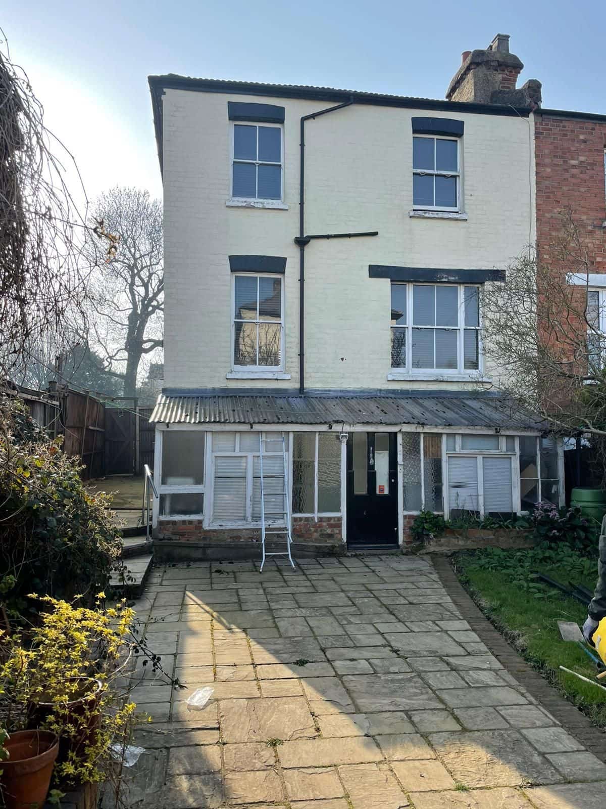 Before: the rear of the house