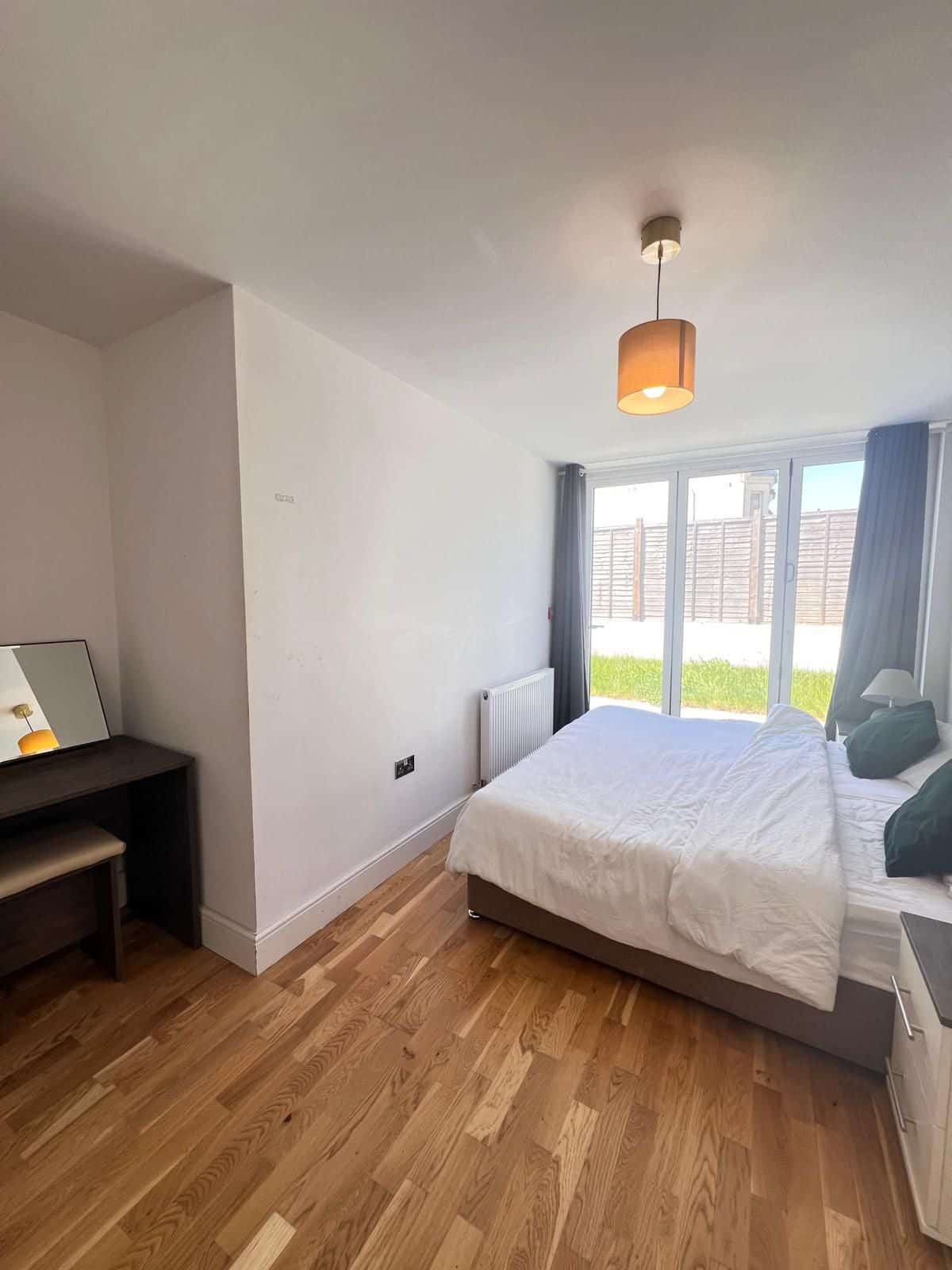 Bedroom with doors onto the garden