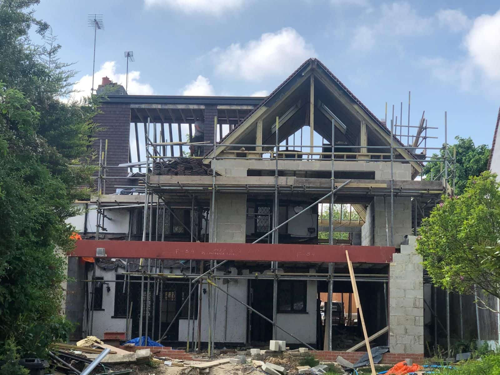 Scaffold down the side as the new roof goes on