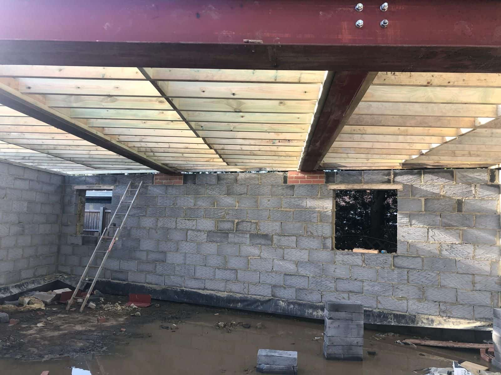 Inside the garden building shell, before fit-out
